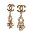 Vintage Chanel 24K Gold Plated Textured CC and Rhinestone Chandelier Clip Earrings on Sale